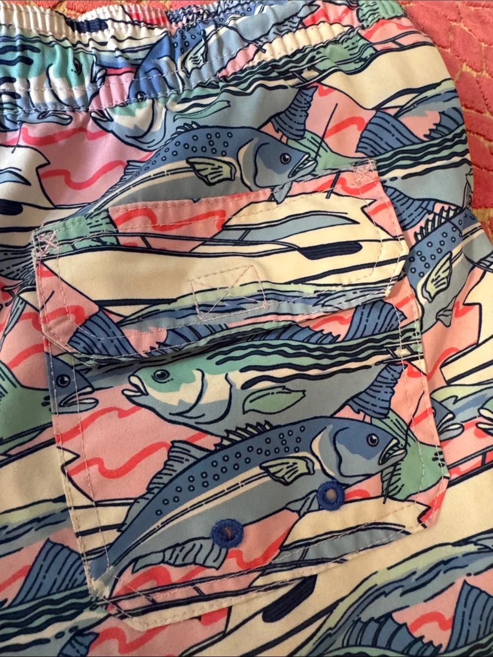 Vineyard Vines Boys Fish Print Swim Trunks in Coral, Blue & Cream medium